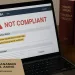 A zoomed-in view of an OSS RBA interface displaying a “Not Compliant” warning, with a PT PMA registration file and Indonesian law books in the background.